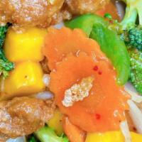 Sauteed Mango · Gluten-Free. Sauteed fresh mango, bell peppers, carrots, onions, and broccoli in a homemade ...