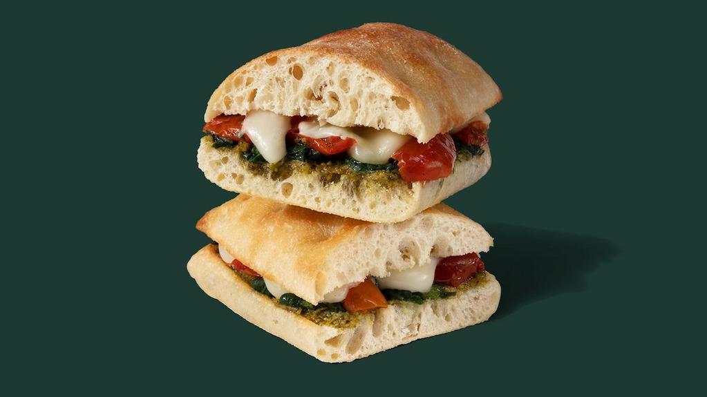 Tomato & Mozzarella On Focaccia · Roasted tomatoes, mozzarella, spinach and basil pesto layered on toasted focaccia bread. - VEGETARIAN - HIGH-PROTEIN