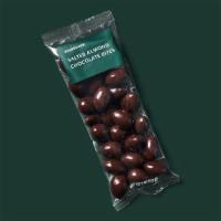 Salted Almond Chocolate Bites · Triple chocolate-covered almonds with gray sea salt: a flavorful nutty-salty experience.