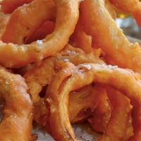 Onion Rings · Battered and deep fried onion rings.