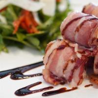 Bacon-Wrapped Dates · Stuffed with feta and mascarpone cheese, drizzled with aged balsamic vinegar glaze. Garnishe...