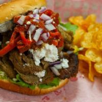 Gyros Burger · Lamb & Beef Gyro Meat with tzatziki, arugula, feta cheese, onion and 
roasted red peppers on...