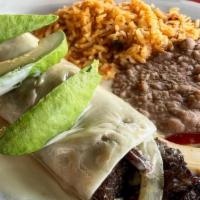 Grilled Burrito · A flour tortilla stuffed with grilled Chicken or steak, bell peppers, and caramelized onions...