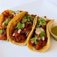 Al Pastor(Pork) · Mexican marinade pork,  onion, cilantro, & salsa.