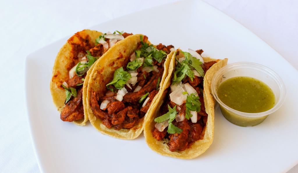 Al Pastor(Pork) · Mexican marinade pork,  onion, cilantro, & salsa.