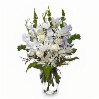 Peaceful Comfort Flowers · Let our shop deliver a lovely floral expression of sympathy and reverence for you. This arra...
