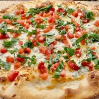 Tomato Basil Pizza · San marzano tomato sauce, melted mozzarella cheese, fresh diced tomatoes, garden grown basil...