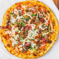 Mega Meat Pizza · Combination with smoked ham, bacon bits, pepperoni, Italian sausage, tasty ground top sirloi...
