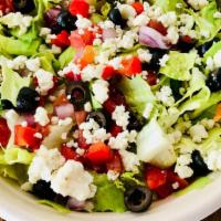 Greek Salad · Crisp romaine lettuce, fresh diced tomatoes, black olives, sweet red onions, fresh peppers a...