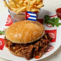 Ropa Vieja Sandwich · Cuban meat stew, lettuce, tomato and onions.