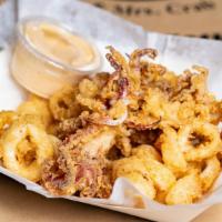 Fried Calamari · Hand battered with our Mr. and Mrs. crab special seasoning. Our crispy calamari will leave y...