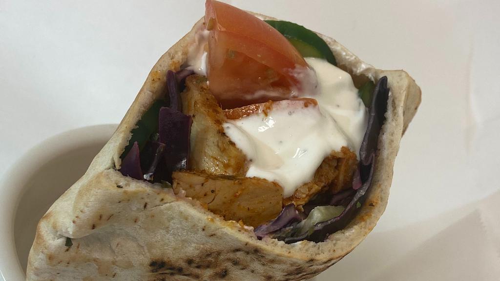 Pocket Pita · Pocket Pita -- Try this great new dish. A perfect pocket pita stuffed with specially marinated grilled chicken, Real Greek filling, tomatoes, and cucumbers. Made to Order!