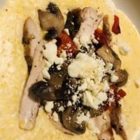 Molly'S Chicken & Grits · Grille chicken, mushrooms, red peppers and feta cheese over a bed of the nook's famous chees...