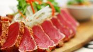 Tuna Tataki · Thin sliced of seared tuna sauce with wakame salad and our special ponzu sauce.