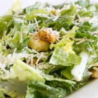 Caesar Salad · Fresh, crisp romaine lettuce hearts, homemade toasted croutons, and shaved parmesan cheese t...