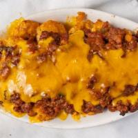 Chili Taters · Cheddar cheese, and homemade chili. Please note that no modifications can be accommodated.