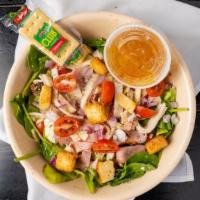 Chef Salad · Garden salad with sliced turkey, ham, and provolone cheese.