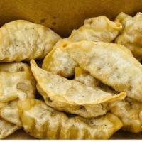 Beef Gyoza (8) · 8 pieces of Beef Gyoza deep fried and served with a 2 oz gyoza sauce.

Additional Sauces can...