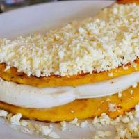Cachapa · Venezuelan sweet corn pancake with Mano cheese or Guayanes