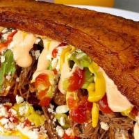 Patacones · Sweet plantain with shredded meat, shredded chicken, pork or mixed, with lettuce, white chee...