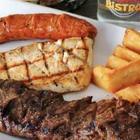 Parrilla Mixta · Grilled steak, chicken, and spanish sausage. Served with one side.