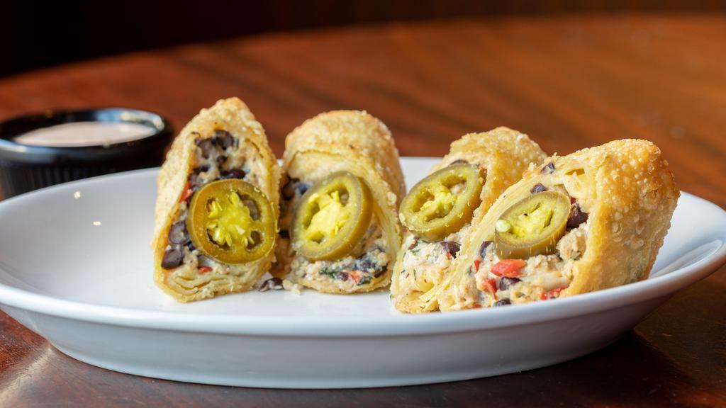 Pub Spring Roll · Pulled chicken, white Cheddar, black bean cilantro, jalapeño, spicy dill.