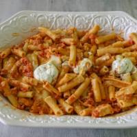 Baked Ziti · Hot, Penne pasta covered with a mixture of rich ricotta, tomato sauce, melted mozzarella, an...