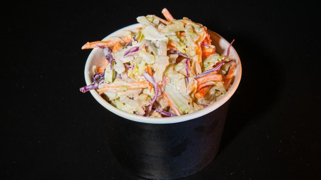 Sam'S Cole Slaw · Shredded carrots, shredded red cabbage, shredded green cabbage, classic sauce.