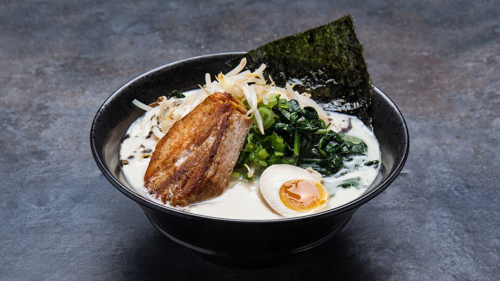 The Classic · Creamy pork broth, bean sprouts, spinach, green onion, black garlic oil and egg.