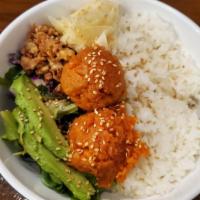 Spicy Tuna Bowl · Spicy tuna, mixed greens, fried onion, onion dressing and avocado over rice.