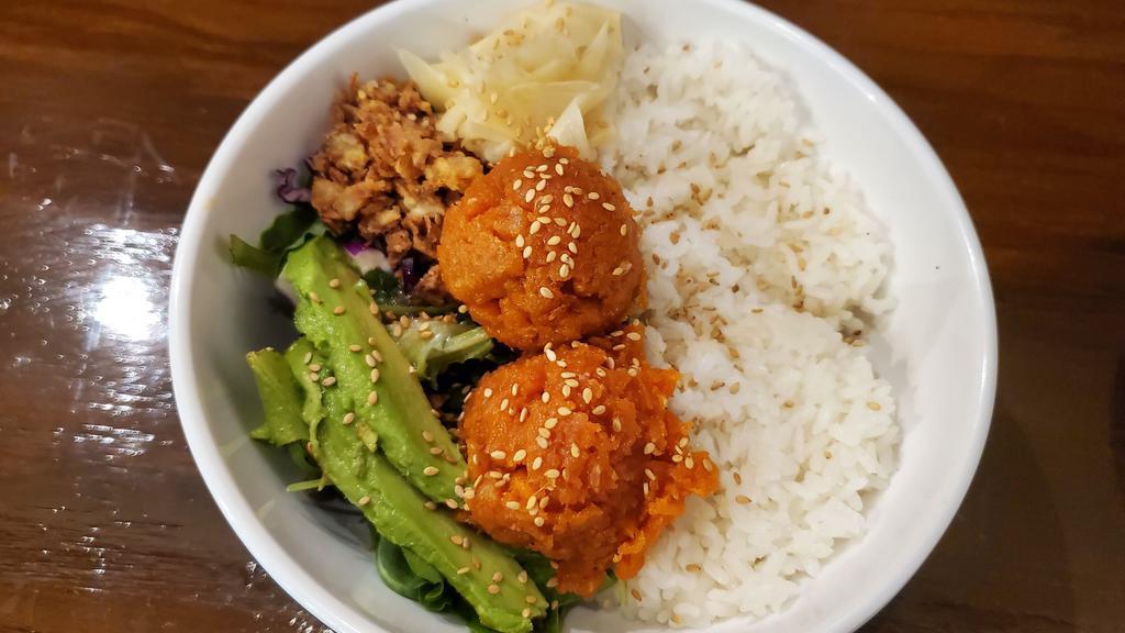 Spicy Tuna Bowl · Spicy tuna, mixed greens, fried onion, onion dressing and avocado over rice.