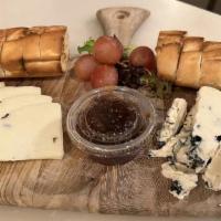 Two Cheeses · Your choice of cheese with bread, fruit and accompaniments.