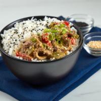 Red Thai Curry Rice Bowl · Thai time! Beef red thai curry over steamed rice garnished with black & white sesame seeds a...