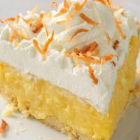 Coconut Cream Pie Slice · A buttery vanilla cream filling blended with shredded coconut, then topped with real whipped...