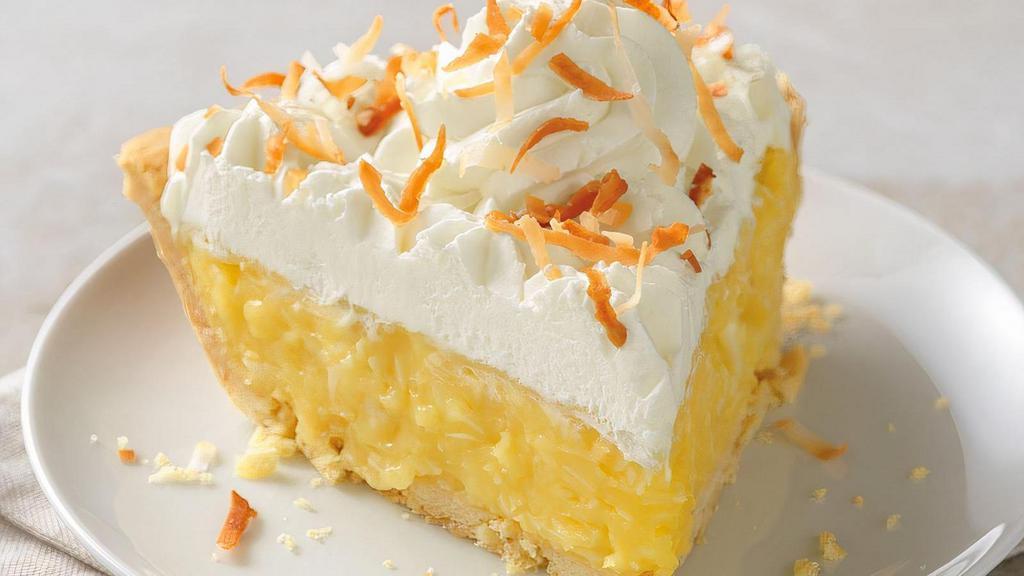 Coconut Cream Pie Slice · A buttery vanilla cream filling blended with shredded coconut, then topped with real whipped cream and toasted coconut shavings inside our award-winning pastry crust.