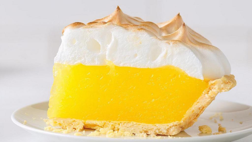 Lemon Meringue Pie Slice · Whipped and baked egg whites are toasted to golden brown to make the light, fluffy meringue that sits on top of an irresistible, tangy lemon filling inside our flaky pastry crust.