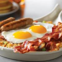 Ultimate Skillet* · Two bacon strips, two sausage links, diced ham, mushrooms, green peppers, onions, tomatoes a...