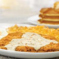 1/2 Lb. Chicken-Fried Steak & Eggs* · smothered in savory country sausage gravy. served with 2 eggs, any style, hash browns and yo...