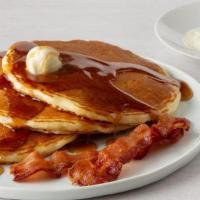Buttermilk Pancake Combo* · One egg, any style, three buttermilk pancakes with two cherrywood-smoked bacon strips, two s...