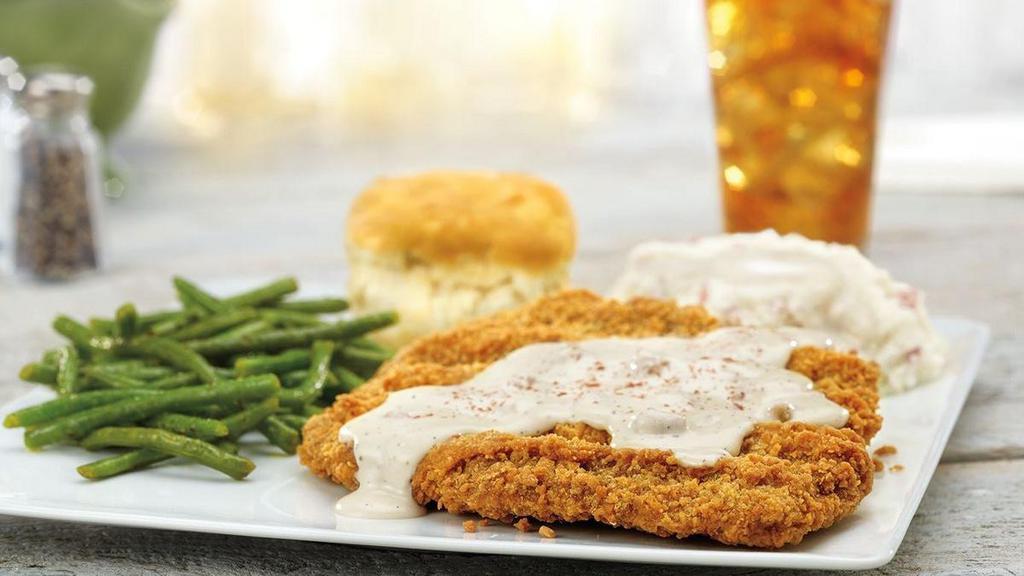 1/2-Lb. Chicken-Fried Steak · Smothered in country sausage gravy, served with mashed potatoes and gravy and a buttermilk biscuit.