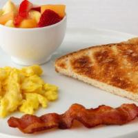 Junior Breakfast* · One fresh egg, choice of one strip of bacon or sausage link and toast with jelly.
