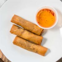 Spring Rolls · Deep fried vegetarian spring rolls with homemade sweet and sour sauce.