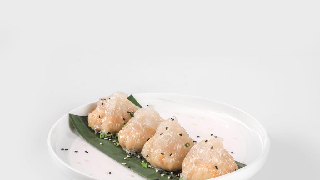 Shrimp Dumplings · Steamed shrimp Thai dumplings with mushroom soy vinegar.