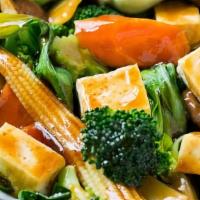 Veggie Delight With Tofu · Sautéed mixed vegetables in light brown sauce.
