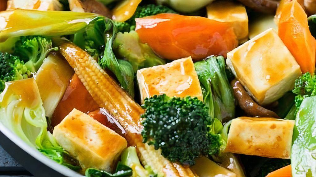 Veggie Delight With Tofu · Sautéed mixed vegetables in light brown sauce.