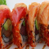 Beauty Dangerous Roll · Red ruby tuna, salmon, avocado, asparagus, and scallions topped with tuna, salmon and spicy ...