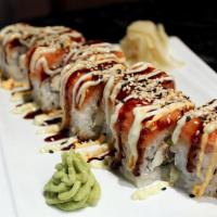 Hawaiian Roll · Spicy tuna, avocado, and cucumber with rolled sesame, topped with grilled eel.