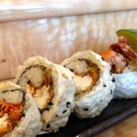 Tarantula Roll · Crispy, soft-shell crab, spicy mayo with sesame, wrapped with transparent rice paper.
