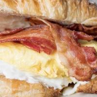 Egg Bacon And Cheese Croissant · Cream cheese, scrambled eggs and bacon.
