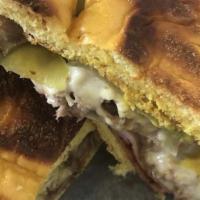 Media Noche Sandwich · Ham, Roasted Park, Swiss Cheese, Mustard & Pickles on toasted soft Medianoche Bread